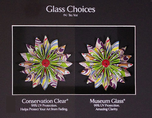 Choose a frame with UV-filtering glass if you’re displaying it in direct sunlight or near any other strong light source